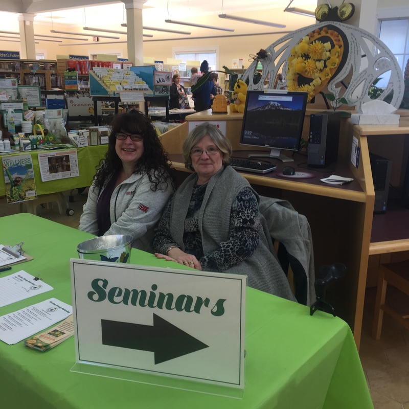 Volunteers at the welcome table